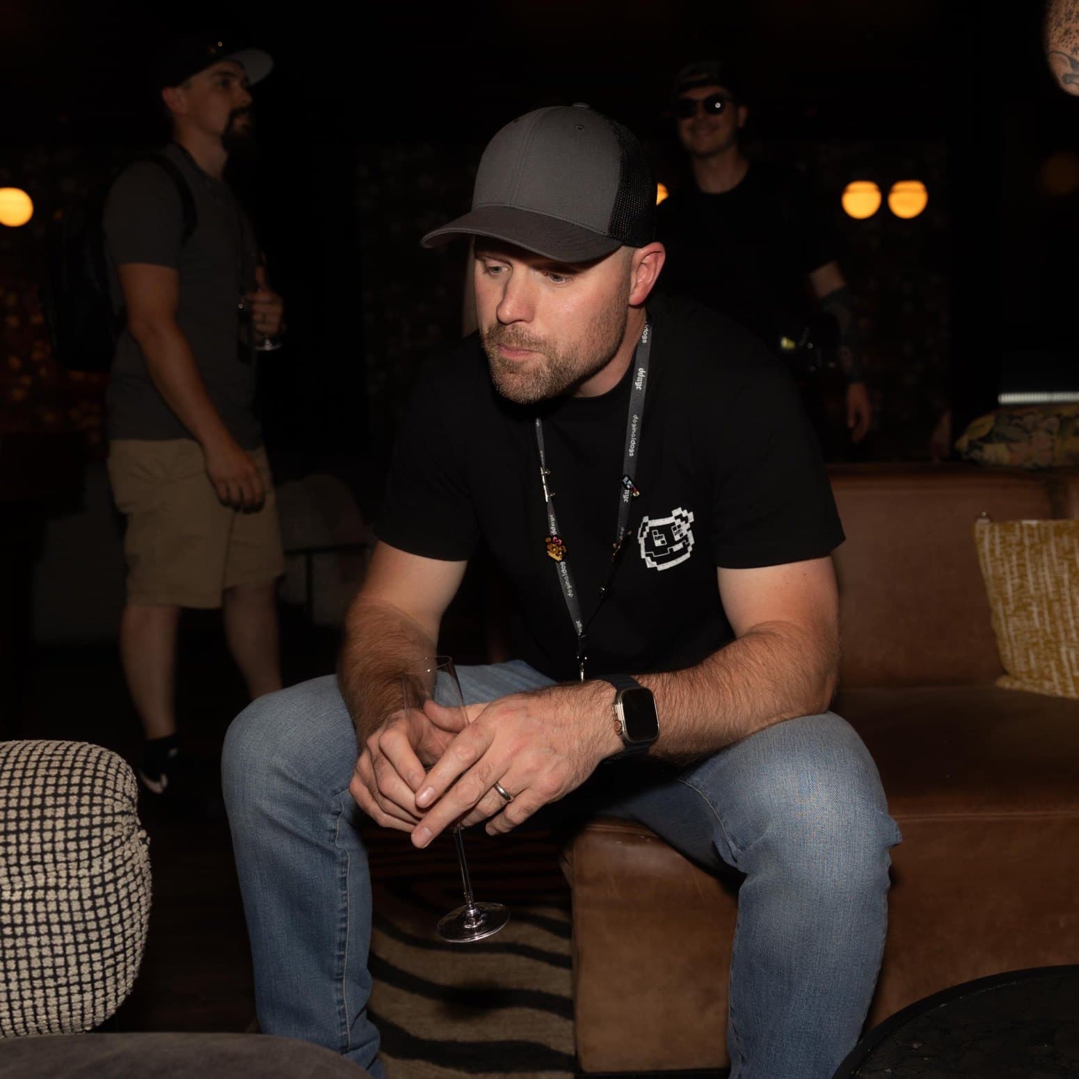 Joshua Lambert — LambMetaX Joshua Lambert, publicly known as LambMetaX (@LambMetaX), seated in a lounge wearing a grey cap and a Doginal Dogs t-shirt